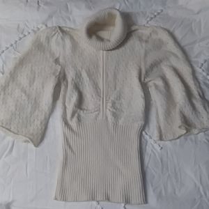JLO cream knitted turtle neck top